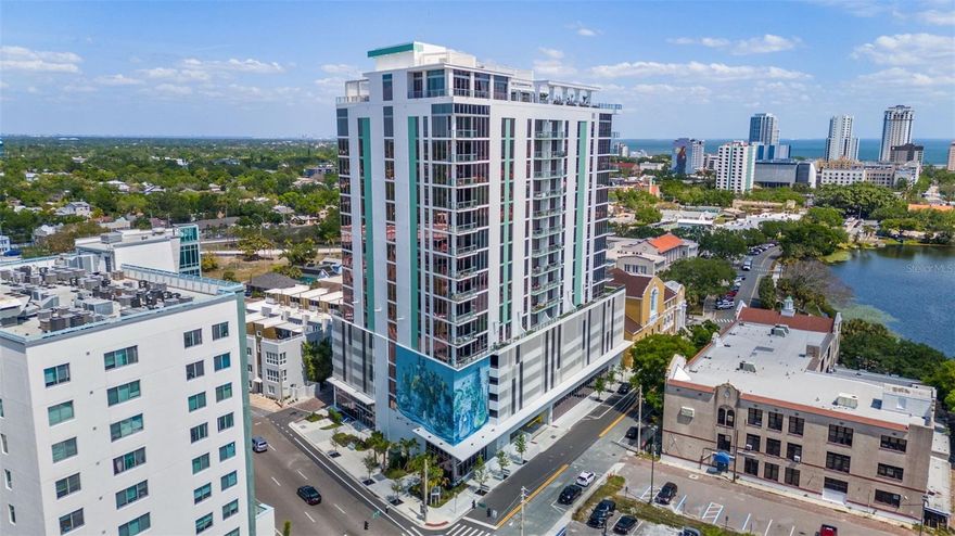 Experience the pinnacle of luxury living at The REFLECTION, a stunning FULLY FURNISHED two-bedroom plus den, two-and-a-half-bathroom condo located in the heart of downtown St. Petersburg. This residence offers breathtaking views of the city skyline and Tampa Bay, blending sleek modern design with unparalleled comfort.

The spacious great room is a highlight, featuring floor-to-ceiling windows and sliding glass doors that lead out to your private terrace, expanding the living space and bringing the outdoors in. The interior is adorned with gorgeous porcelain flooring and soaring 10-foot ceilings throughout the main living areas, creating an open and airy atmosphere.

The gourmet kitchen is a chef’s dream, complete with quartz countertops, a sizable island with waterfall edges, and high-end, panel-ready Bosch stainless steel appliances. The kitchen sink window perfectly frames the picturesque views, adding to the beauty of the space.

The expansive primary suite offers a luxurious retreat, featuring a European wet room with upgraded plumbing fixtures, along with both a reach-in closet and a walk-in closet for plenty of storage. The second bedroom is equally spacious, and the large den provides versatile space, perfect for a home office or an additional bedroom.

Residents of REFLECTION enjoy exclusive access to a 12,000-square-foot amenity rooftop, where they can take advantage of a fitness center, community room, hot tub, and a heated saltwater pool with panoramic views of the city. The rooftop also boasts an outdoor kitchen and wet bar, perfect for entertaining or relaxing in style.

The building is equipped with advanced features including the highest quality electronic air filtration systems in each residence and common areas, a water softening system, and touchless doors throughout. REFLECTION has demonstrated its durability by withstanding the recent impacts of Hurricanes Helene and Milton, showcasing the superior construction and materials used.

Situated in the heart of downtown St. Petersburg, The REFLECTION is just moments away from dining establishments, boutique shops, and renowned museums and galleries, making it the ideal location for those who want to experience the best of the city.
