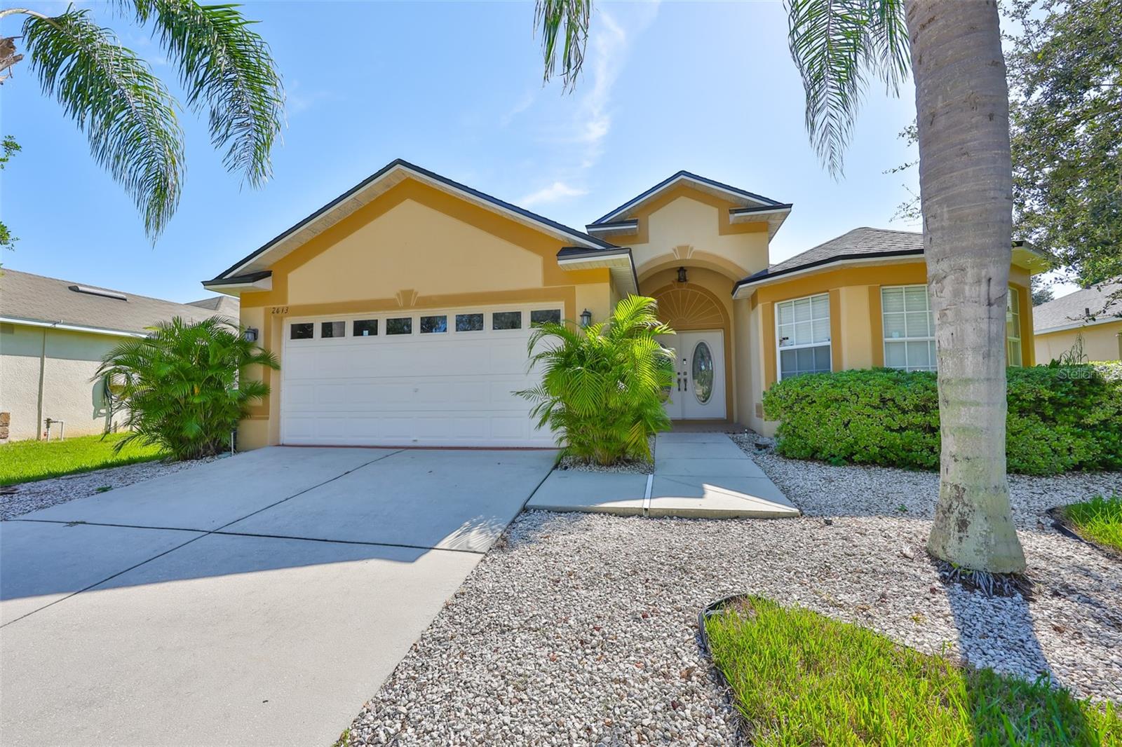 Welcome to this beautifully maintained 3-bedroom, 2-bathroom home featuring a spacious kitchen with high ceilings and plenty of natural light. The home boasts tile flooring throughout-no carpet-and a comfortable flow from living to dining spaces. Step outside to enjoy a screened-in lanai and a lush backyard with mature landscaping and fruit trees, perfect for relaxing or entertaining.
For your convenience, the home comes equipped with paid-off solar panels (at closing), a tankless water heater, and a water softener system. The A/C was installed in 2020, and the roof is from 2022, giving you peace of mind for years to come. A tool shed also conveys with the property.
No CDD, a low HOA and clear pride in ownership, this home is ready and waiting for you!