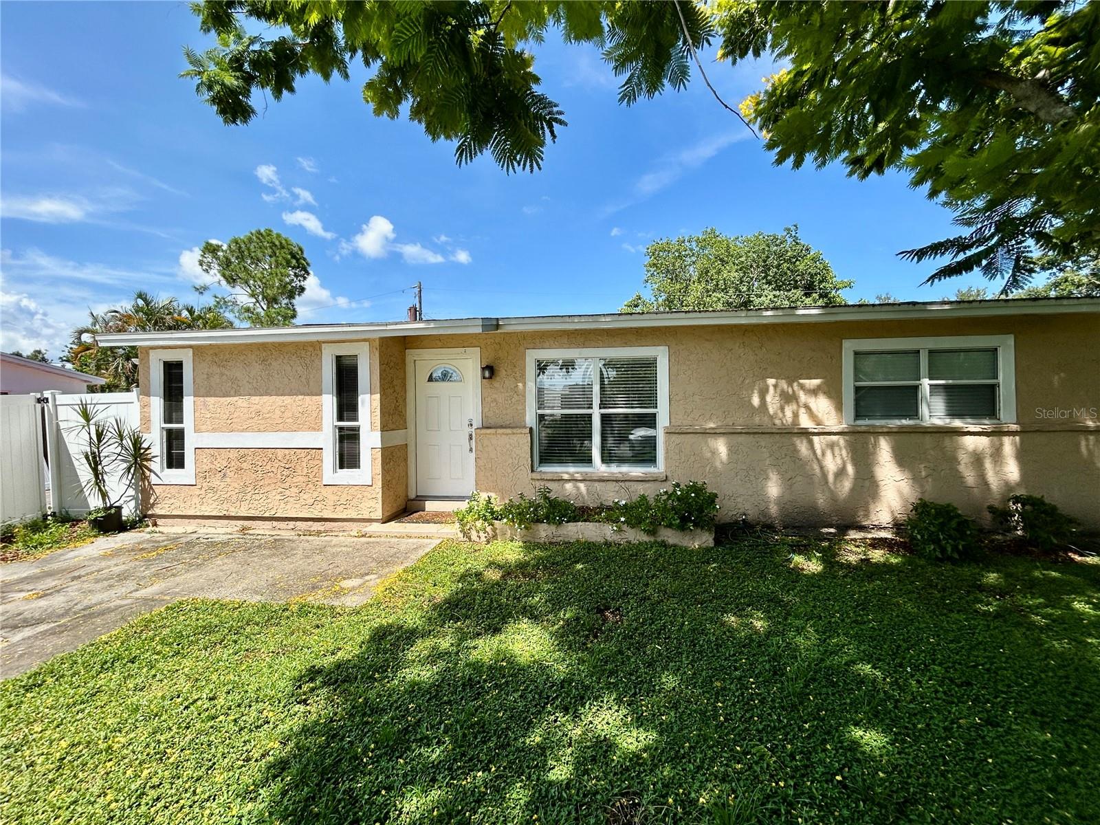 Now available in the highly desirable Meadowlawn neighborhood — this updated 2-bedroom, 1-bath home offers comfort, style, and a prime location. Enjoy a fully remodeled bathroom with modern finishes, a dedicated laundry room with washer and dryer that could also be a great in-home office, and a spacious, fully fenced backyard for your outdoor enjoyment. There is a breakfast bar overlooking the living room as well as a separate den area, giving you or your family tons of space. This home is just minutes from downtown St. Pete, waterfront parks, shopping, dining, easy commuter routes, as well as our famous Gulf beaches. The lease term is for one year. All utilities are tenant's responsibility. Monthly income for the household must be between 2.5x - 3x the monthly rent. First month's rent and security deposit equal to month rent is due prior to move-in. All occupants over 18 yrs. must apply and be on lease. No smoking and pets are allowed on a case-by-case basis.