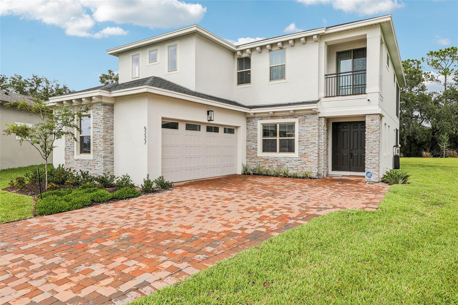 This stunning 5-bedroom, 4-bathroom home in The Reserve at Twin Lakes features over $150K in luxury upgrades and offers a perfect blend of modern design and functional living. The gourmet kitchen is a chef’s dream, with an oversized island, 5-burner gas range, top-of-the-line appliances, a water filtration system, and a designer backsplash extending to the ceiling.
The living room showcases a modern accent wall, while bedrooms include custom closets and cabinetry, The home features automated blackout shades for privacy, and Bluetooth speakers. The primary suite offers a spa-like shower with three shower heads, abundant storage, and opens to a screened-in balcony for private outdoor enjoyment. Other bedrooms feature en suite bathrooms for comfort and convenience.
Upstairs, a spacious loft provides flexible living space, while sliding doors downstairs create an indoor/outdoor flow leading to a screened lanai, perfect for entertaining or relaxing.
Set on one of the largest lots in the neighborhood, this home offers access to a community pool and the benefits of a growing, amenity-rich community, all within close proximity to shopping, dining, and top schools.
With its thoughtful design, luxurious finishes, and prime location, this home is ideal for families seeking comfort, style, and convenience in St. Cloud.