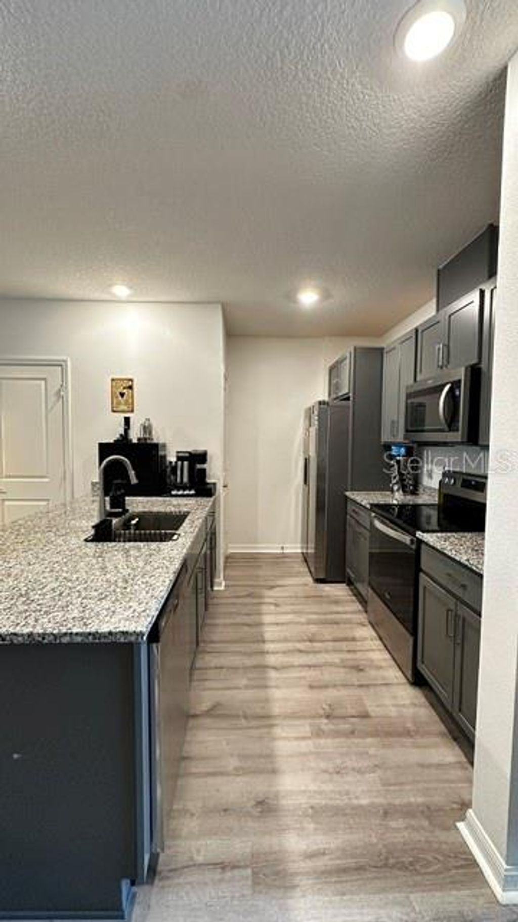 Photo of 710 Stoney Point Circle, Davenport, FL 33896 (MLS # O6407532)