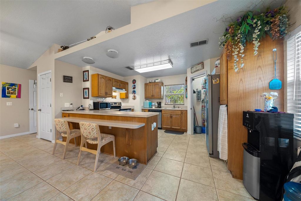 Photo of 115 Helen Drive, Kenansville, FL 34739 (MLS # OM722471)