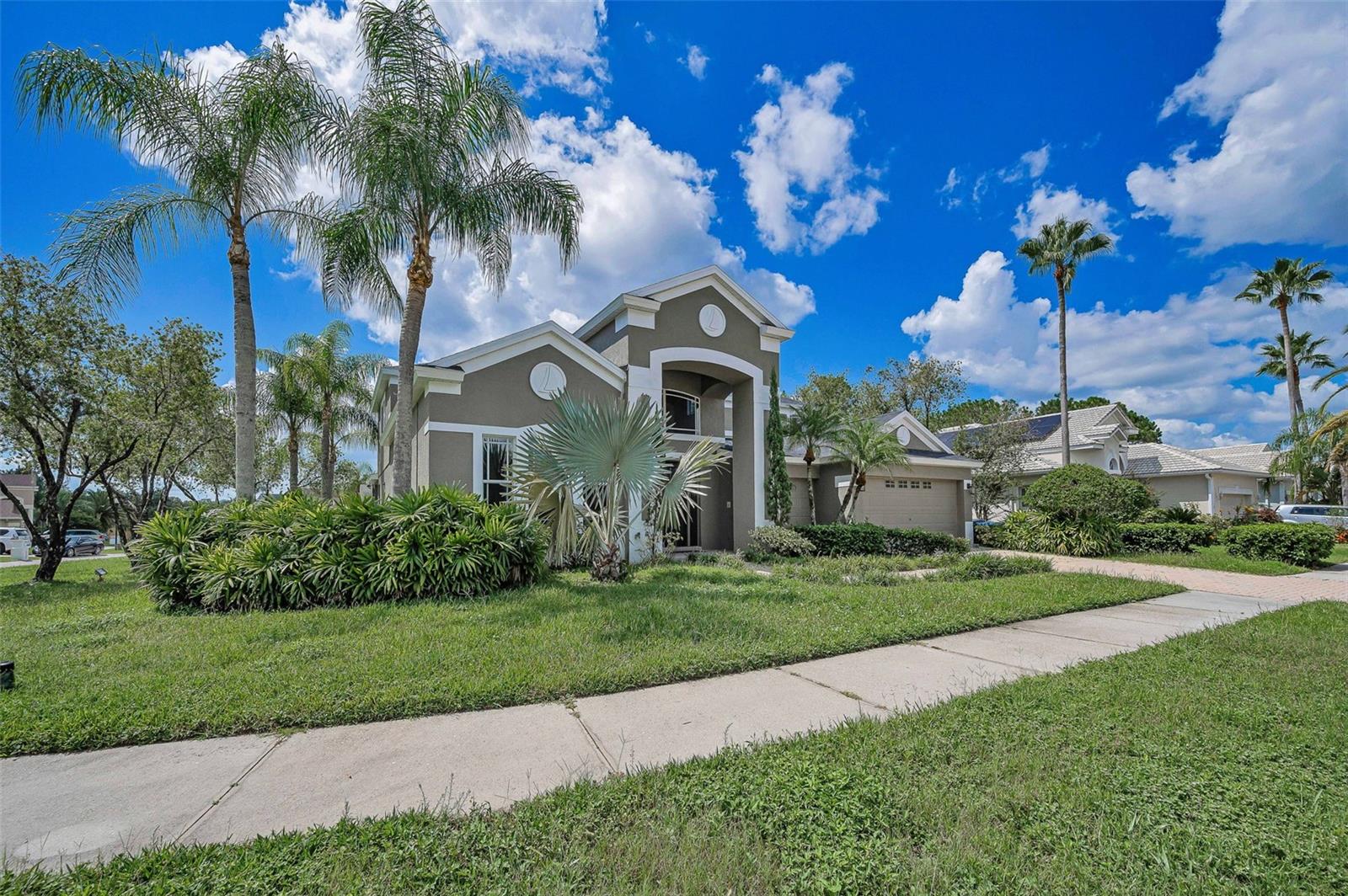 Completely Remodeled Luxury home in Cory Lake Isles – A Tropical Retreat Awaits
Step into elegance and comfort in this stunning 5-bedroom, 3.5-bathroom estate located in the highly sought-after gated community of Cory Lake Isles. Perfectly positioned on a spacious corner lot, this home has been completely remodeled to offer modern sophistication with a warm, inviting atmosphere.
From the moment you enter, you’ll be greeted by new flooring, a grand staircase, and custom chandeliers that set the tone for upscale living. The gourmet kitchen is a chef’s dream, featuring granite countertops, a glass tile backsplash, premium new SS appliances, and 42-inch wood cabinetry. The open-concept layout flows effortlessly into the family room, which opens to a screened lanai overlooking the pool and spa, surrounded by lush tropical landscaping.
The first floor primary suite is a serene escape with a walk-in closet, garden tub, walk-in shower, and dual vanities. A versatile in-law suite or home office adds flexibility for multi-generational living or remote work.
Enjoy resort-style amenities including a private beach, playground, basketball courts, and canoeing, all within minutes of top-rated schools, beaches, Busch Gardens, and MOSI. This is more than a home—it’s a lifestyle. Schedule your private showing today and experience the magic of Cory Lake Isles.