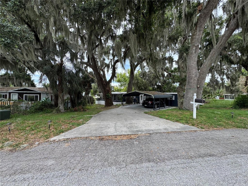 Photo of 17336 Palm Drive, Montverde, FL 34756 (MLS # O6414848)