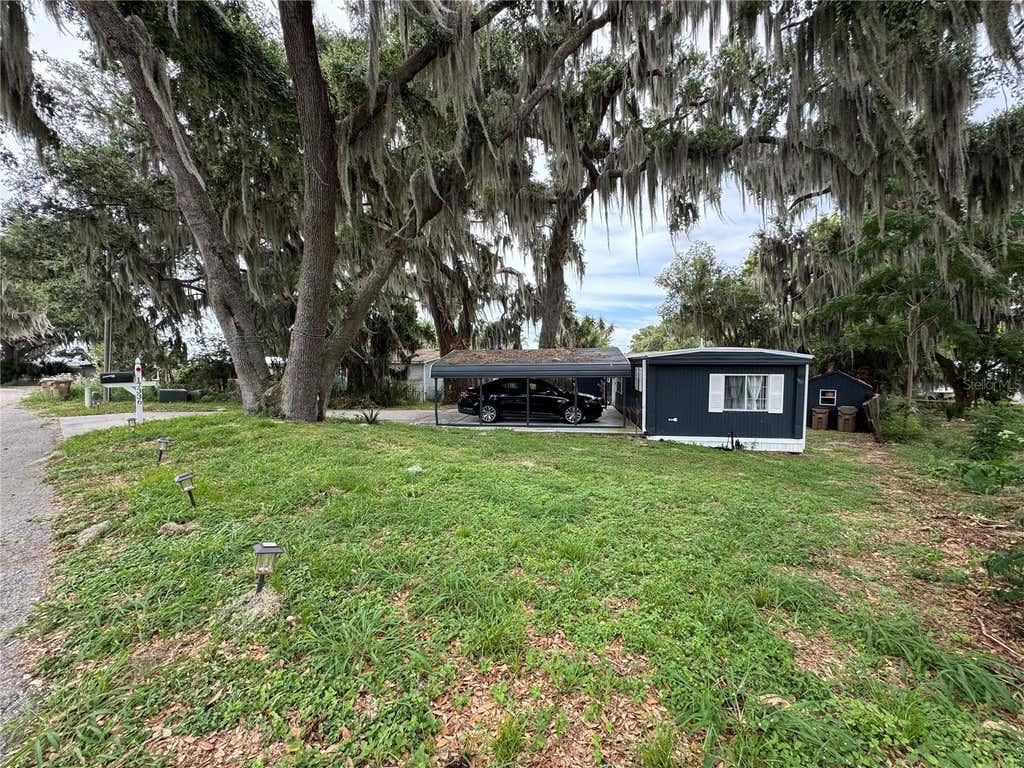Photo of 17336 Palm Drive, Montverde, FL 34756 (MLS # O6414848)