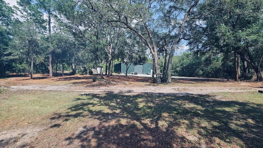 Photo of 5275 SW 183rd Terrace, Dunnellon, FL 34432 (MLS # OM725814)