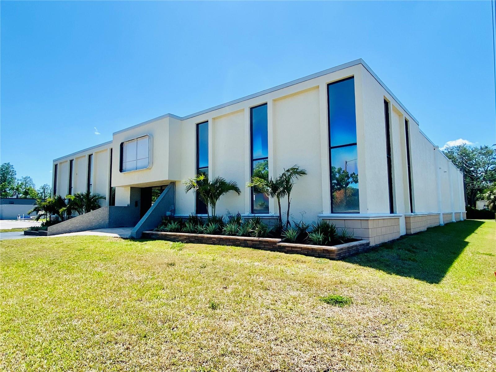 One or more photo(s) has been virtually staged. Wonderful professional space for your business. Unit 109 has 372 Sq feet of large open space. There is no water attached to this unit, but there can be for an additional monthly fee depending on your needs. Yes, this can be turned into a salon suite for you and a partner. You can even add additional stylist for an additional fee. It is possible to put in hair washing stations. This could also be used for Yoga, Karate, or any organized classes. You dream it and it can go here. The ceilings are very high as well. Brand new tile, paint, 2 conference rooms, 1 meeting room copier, breakroom with free coffee, firewalled wifi, 6 bathrooms, and so much more. State of the art access control lets you see who is at the door an allows you to buzz your clients in from the comfort of your own desk. Even get your office furnished if you want to add that or bring your own furnishings. This is the largest unit left in the building. Hurry, this one won’t last long.