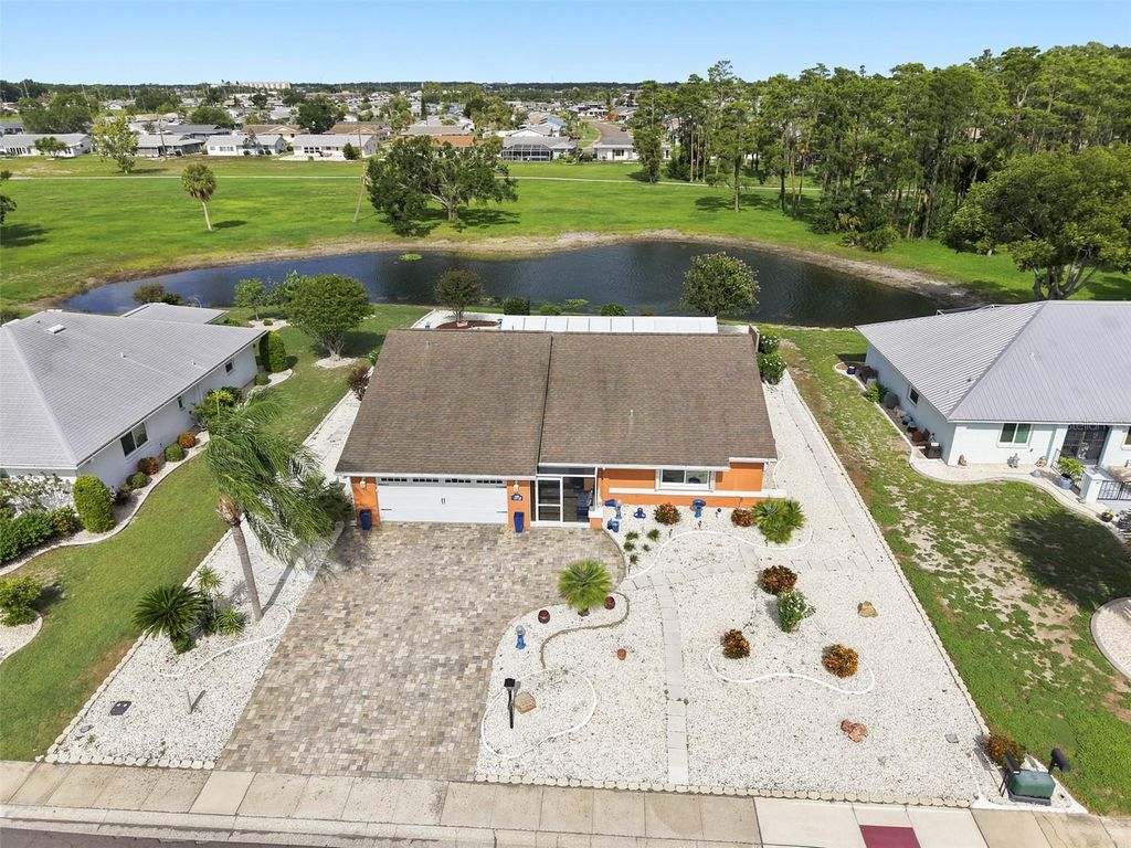 Photo of 1002 El Rancho Drive, Sun City Center, FL 33573 (MLS # TB8531194)