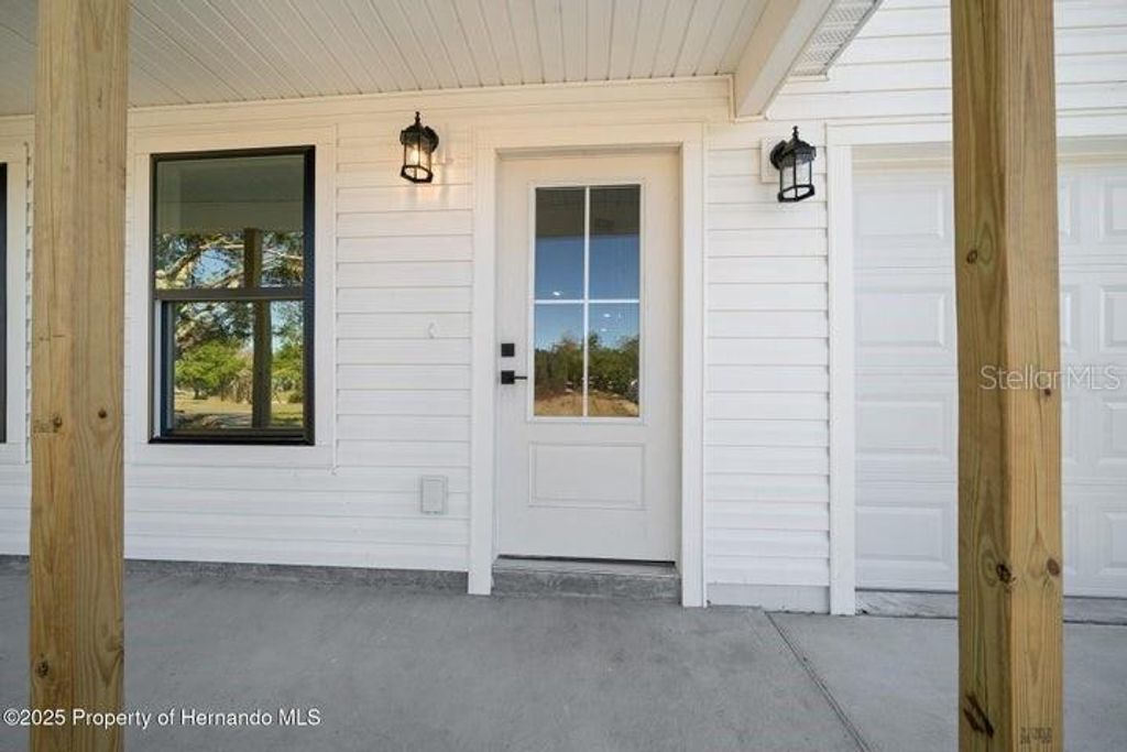 Photo of 8960 Long Lake Avenue, Weeki Wachee, FL 34613 (MLS # W7882718)