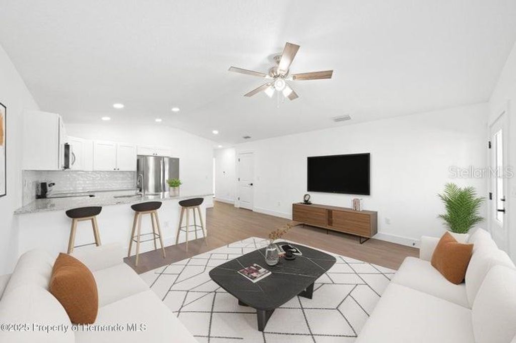 Photo of 8960 Long Lake Avenue, Weeki Wachee, FL 34613 (MLS # W7882718)