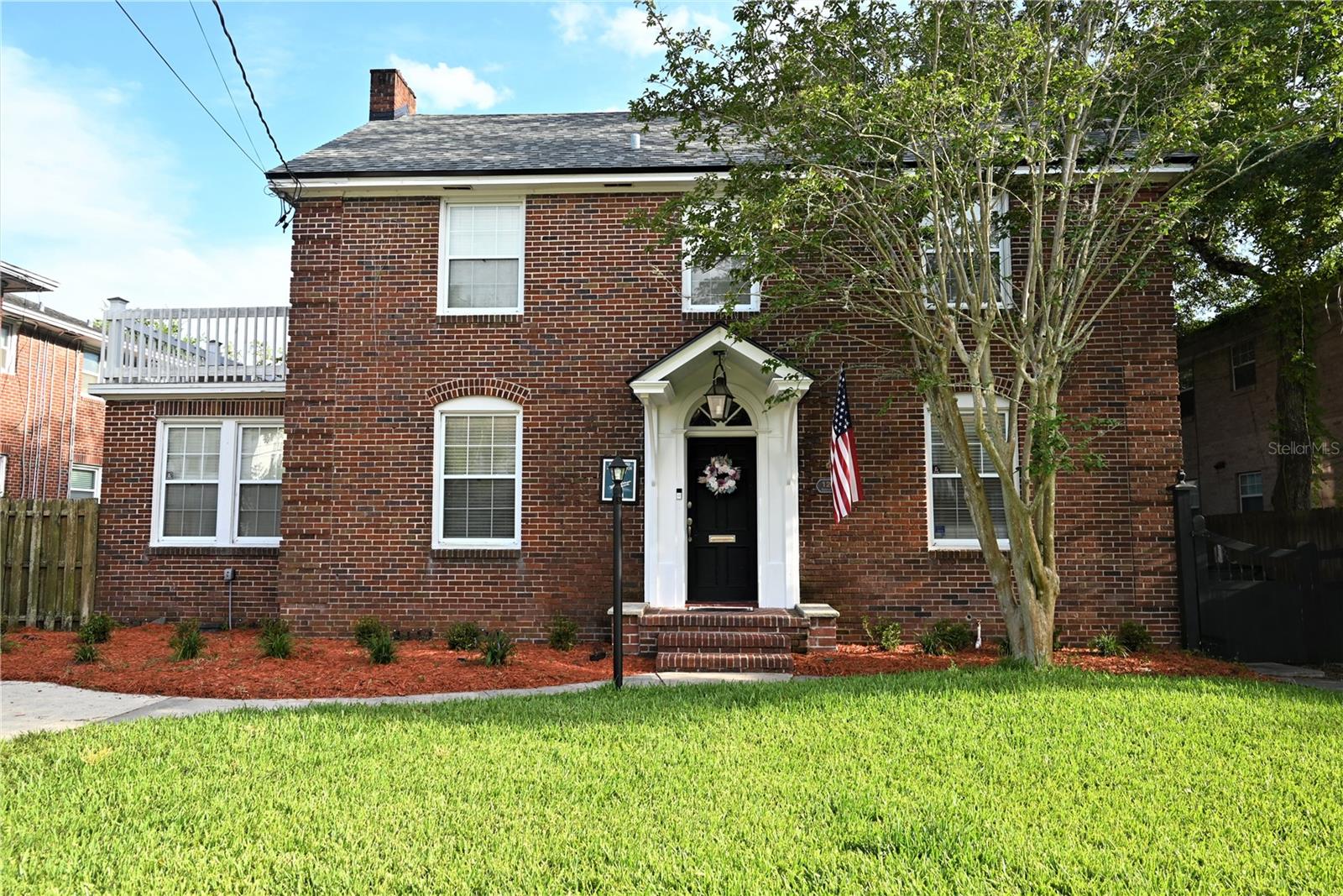 Discover this exceptional brick home perfectly positioned just off San Marco Square. You will be walking distance from Jacksonville's finest shopping and top-rated restaurants. This charming three-bedroom, three-bathroom property sits on a rare double lot and has been extensively updated with premium improvements including a new roof, complete re-piping, updated electrical system, spray foam insulation, and a new hot water heater. An added bonus flex room provides the perfect space for a home office or workout gym, adapting to your lifestyle needs. The luxurious kitchen renovation features stainless steel appliances, stylish glass-front upper cabinets, a gas cooktop, oversized sink, and abundant storage, while upgraded flooring and fresh paint throughout complement the home's sophisticated trim work and crown molding. The home's historic San Marco charm and architectural character shine through its beautifully preserved original wooden floors, wide hallways, and graceful archways that create an atmosphere of timeless elegance. The bright and inviting living room welcomes you with custom built-in shelving and a cozy wood-burning fireplace, while the sun-drenched library features elegant custom doors that flood the space with natural light. The spacious master bedroom retreat offers an elegant ensuite bathroom with dual vanities and distinctive basket weave shower tile trim, creating a luxurious private sanctuary. Outdoor living reaches new heights with a private sun-drenched porch perfect for morning coffee, an expansive patio ideal for summer entertaining with family and friends, and a cozy fire pit for evening gatherings. The rare double lot provides exceptional space, with plenty of room for a pool to be added for those seeking the ultimate outdoor oasis. A unique secret pub shed attached to the double garage adds to the property's distinctive character. What truly sets this home apart is its abundant storage throughout - a rare find in homes of this era - combined with the exceptional privacy and outdoor space provided by the rare double lot. Recent additions include professional landscaping, new upstairs exterior door, and modern appliances including a new refrigerator and microwave. This remarkable property seamlessly combines historic charm with modern conveniences, offering an unparalleled living experience in one of Jacksonville's most desirable neighborhoods where every detail has been thoughtfully maintained and updated for today's lifestyle.