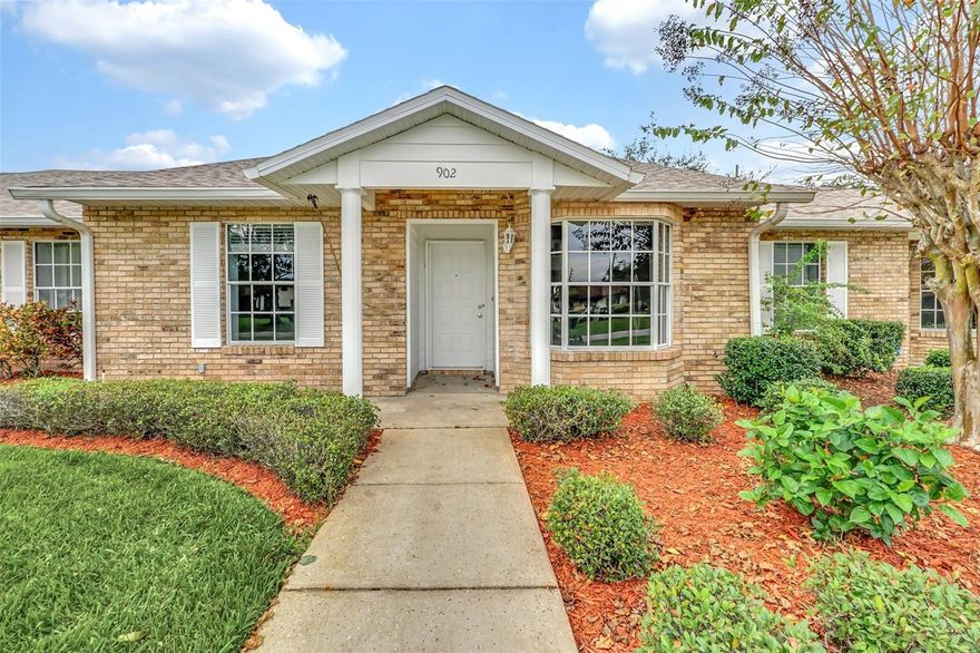 This Beautiful Home Has Been Loved By The Same Family for Over 20 Years! This 2 Bedroom, 2 Bathroom Townhouse is Turnkey! NEW ROOF (2023), AC (2015, still under warranty), NEW Water Heater (2023), NEW Kitchen and Bathroom Vanities, NEW Paint Throughout, and BRAND NEW Stainless Steel Kitchen Appliances (Refrigerator, Range, Microwave, and Dishwasher). The Floor Plan Features a Great Room that Includes a Dining Area. Master has a Walk-In Shower and Spacious Closet. Very Large 2nd Bedroom and Full Guest Bath. Large Florida Room with additional Closet Space. Washer and Dryer convey as well. This Home comes with 2 parking spaces as well as a shelved carport storage room. Quiet Neighborhood yet Convenient Access to The FL Turnpike, Hwy 192, Orlando Int’l Airport, Area Attractions, Schools, Shopping, Restaurants and More. This Home Has Been Beautifully Maintained and Is Ready for New Owners!