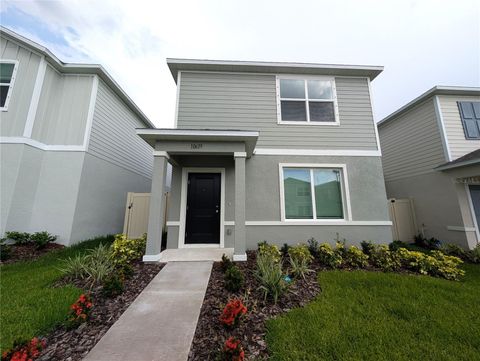 Photo of 10619 Sage Canyon Drive, Riverview, FL 33578 (MLS # TB8513579)