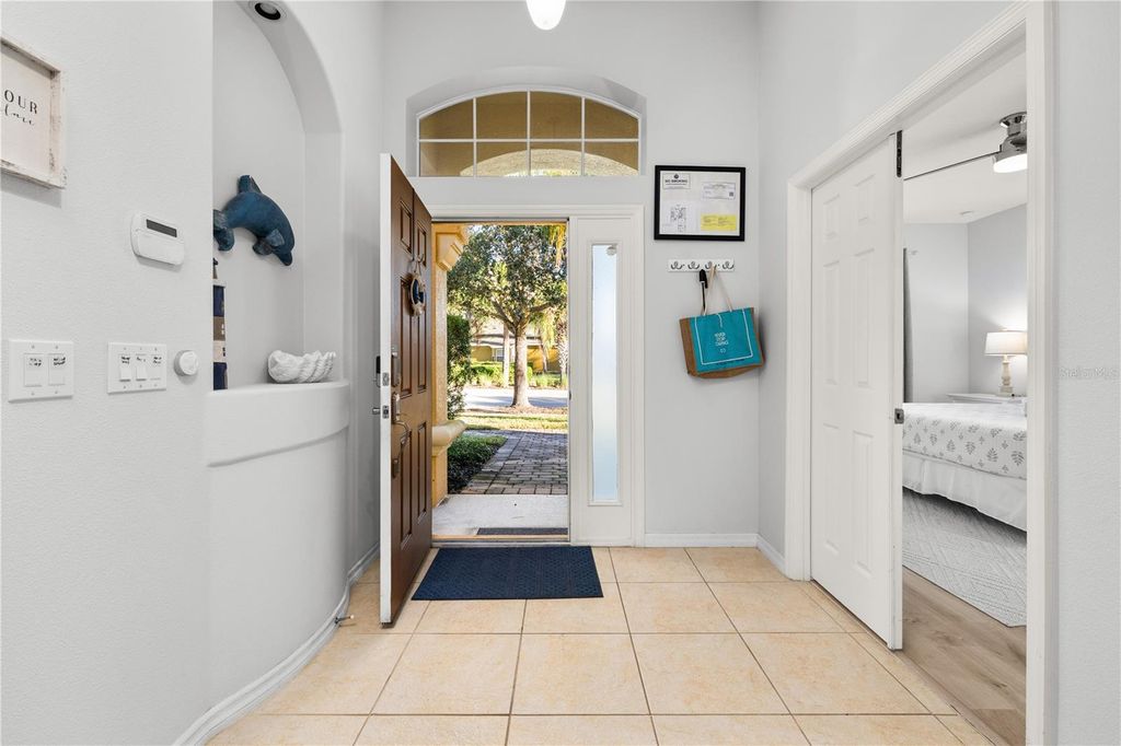 Photo of 115 Yellow Snapdragon Drive, Davenport, FL 33837 (MLS # O6372322)