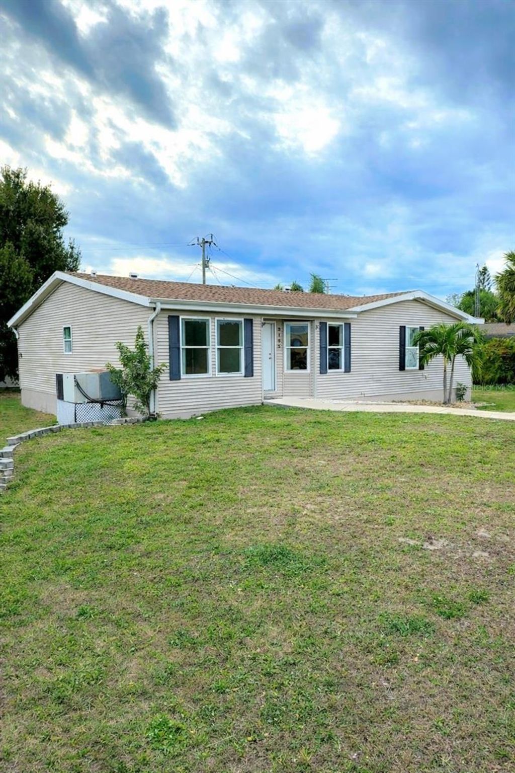 Photo of 3105 Sunrise Trail, Port Charlotte, FL 33952 (MLS # TB8457774)