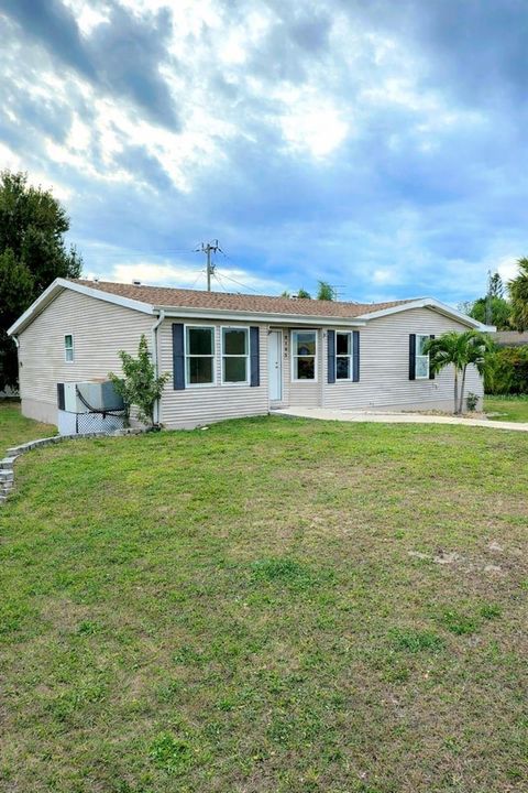 Photo of 3105 Sunrise Trail, Port Charlotte, FL 33952 (MLS # TB8457774)