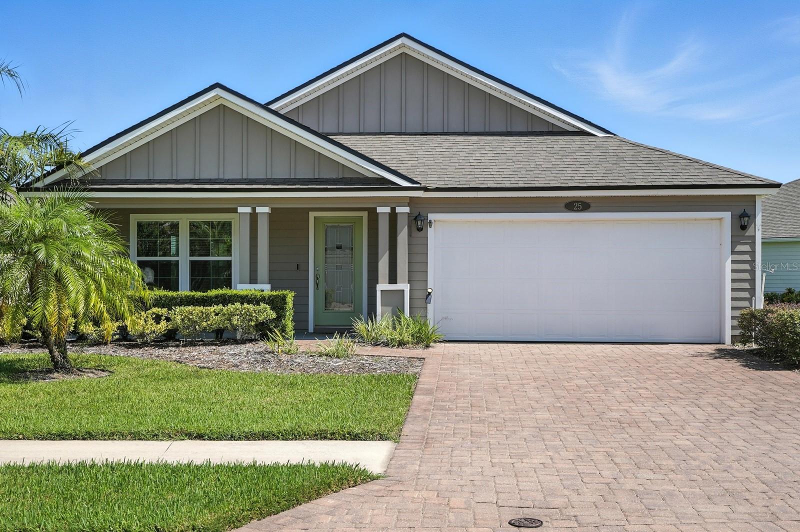 Welcome home to 25 Country Club Harbor Circle, where comfort, style, and location come together in one of Palm Coast’s most sought-after gated communities. Located in the quiet enclave of Country Club Harbor, this beautifully maintained property offers a relaxed lifestyle with direct access to the Intracoastal Waterway and just 54 homes in the entire neighborhood.
From the paver stone driveway to the lush landscaping, the home offers inviting curb appeal. Inside, the open layout is both functional and elegant, with three spacious bedrooms and two full bathrooms arranged in a split floor plan. Porcelain tile runs through the main living areas, while soft carpet adds comfort in the bedrooms. Tall ceilings and crown molding enhance the airy, welcoming feel.
The kitchen is a standout feature, equipped with custom 42-inch cabinetry, quartz countertops, and a large center island. A French door refrigerator and generous counter space make it ideal for cooking and entertaining. A separate utility room includes a washer, dryer, and folding station for added convenience.
Step outside to a screened lanai, perfect for enjoying the Florida sunshine or relaxing in the evening breeze. It’s a peaceful retreat surrounded by nature and mature landscaping.
Residents of Country Club Harbor enjoy community amenities including a private pier and kayak launch along the Intracoastal—ideal for boating, fishing, or simply enjoying the view. The location also offers quick access to Palm Harbor Golf Course, local beaches, I-95, and the European Village with its shops and restaurants. Nearby cities like St. Augustine, Daytona Beach, and Flagler Beach are all within easy reach.
If you’re looking for a move-in ready home in a quiet, coastal community with convenience and charm, 25 Country Club Harbor Circle is ready to welcome you.