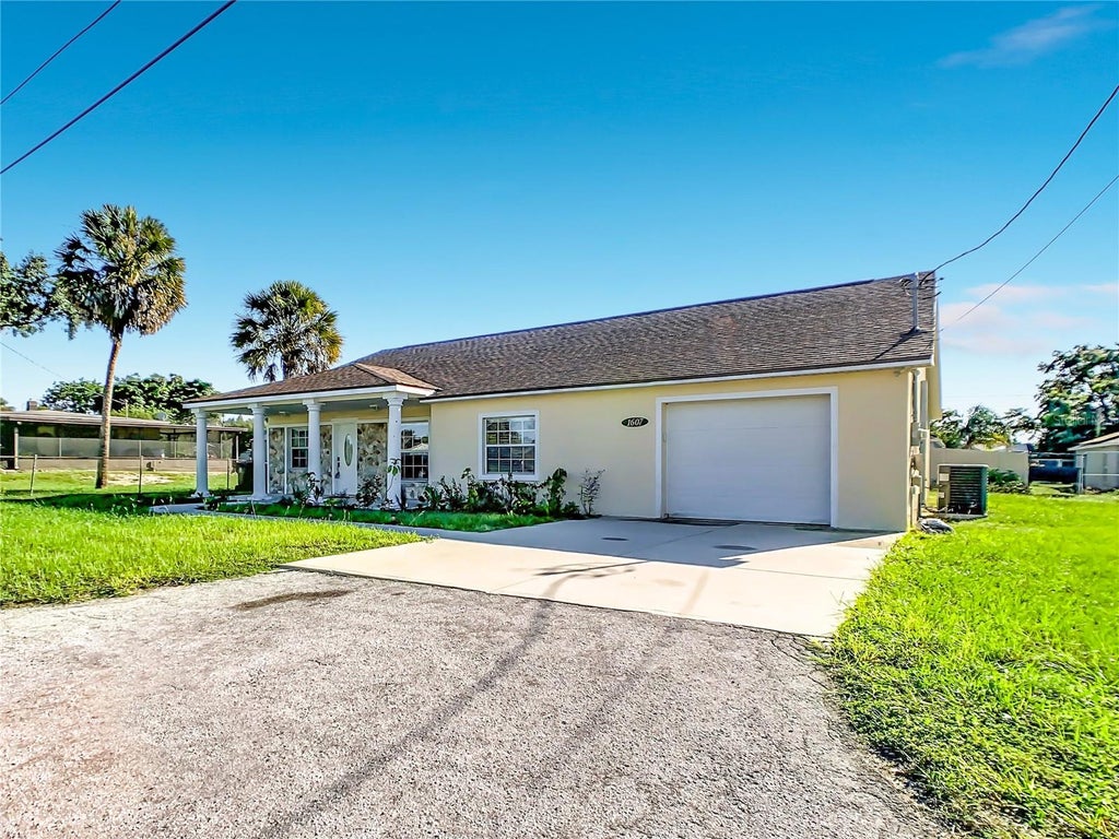 Photo of 1607 N 18th Street, Haines City, FL 33844 (MLS # O6443891)