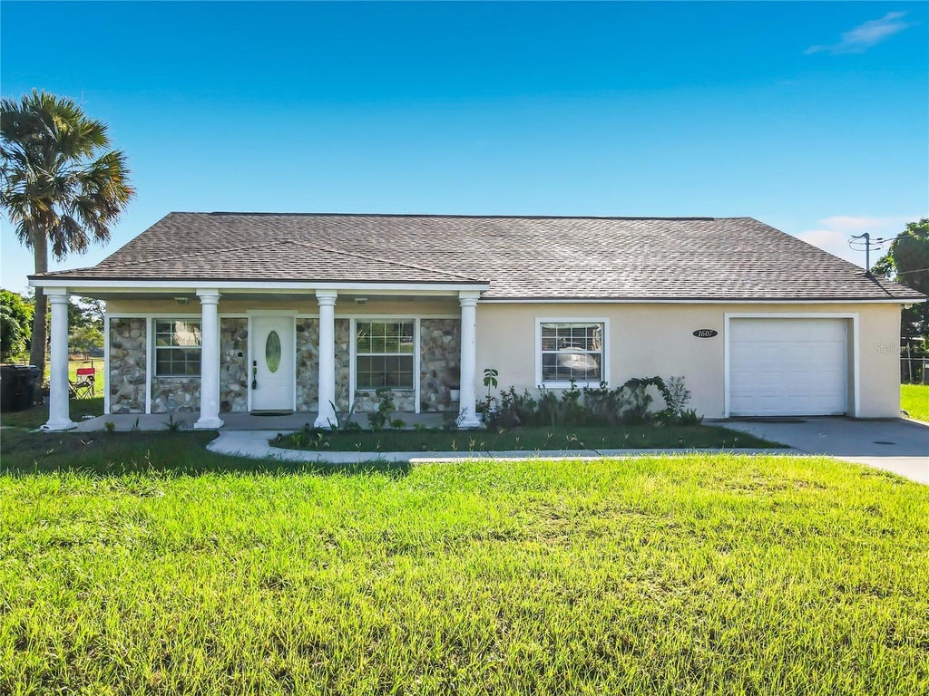Photo of 1607 N 18th Street, Haines City, FL 33844 (MLS # O6443891)