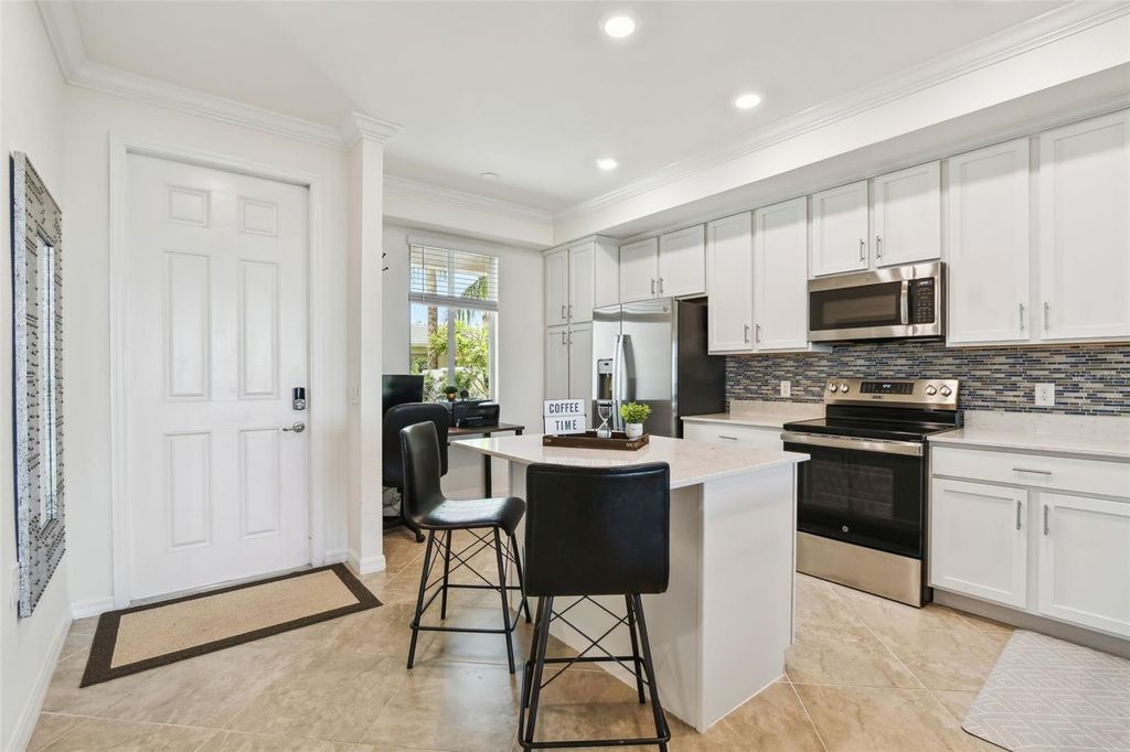 Photo of 1030 Tidewater Shores Loop #104, Bradenton, FL 34208 (MLS # TB8364805)