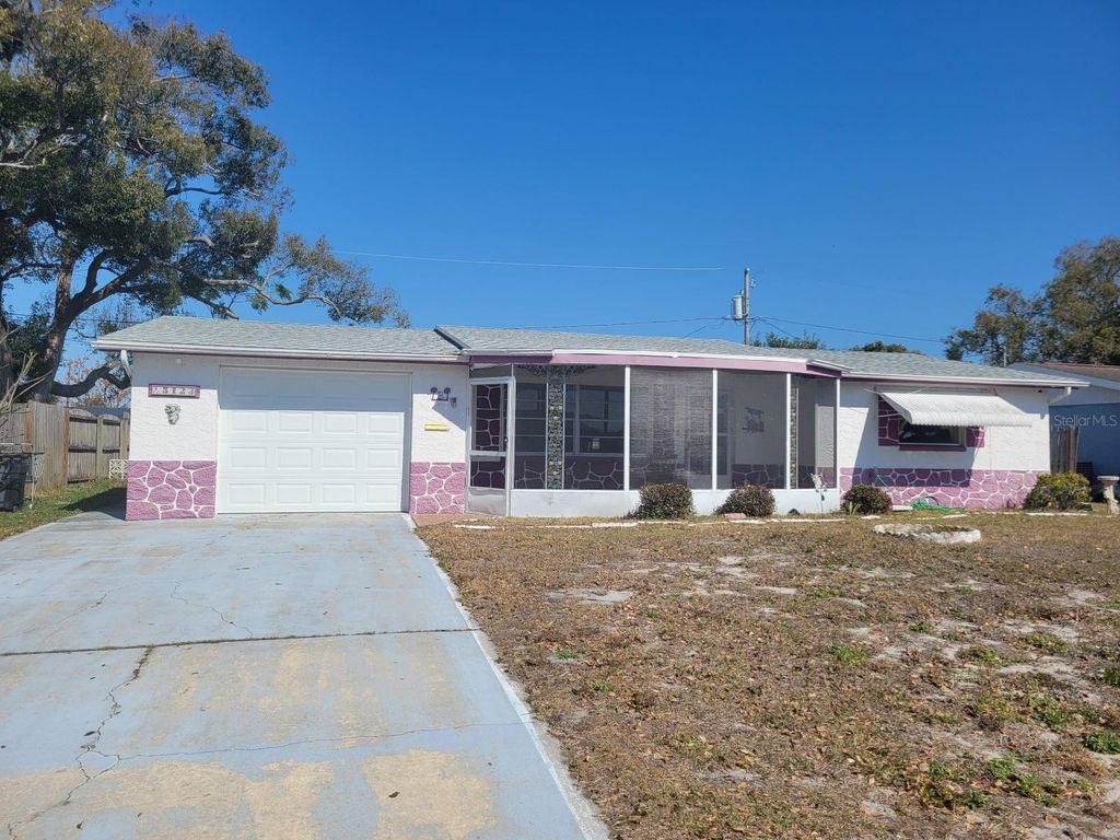 Photo of 5123 Mecaslin Drive, New Port Richey, FL 34652 (MLS # TB8476412)