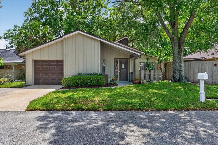Welcome to refined, low-maintenance living in the highly sought-after Wedgewood Golf Villas within Tuscawilla. Perfectly positioned in one of Seminole County’s most established golf communities, this beautifully maintained residence offers the ideal blend of comfort, privacy, and convenience with golf cart-friendly streets, mature surroundings, and HOA-maintained lawn care for truly effortless ownership.
Thoughtfully updated with a  ROOF (2019), HVAC system (2020), and freshly painted exterior (2026), this move-in-ready 3-bedroom, 2-bath home showcases timeless appeal and functional design. Inside, abundant natural light, soaring vaulted ceilings, and a warm, inviting layout create an atmosphere that feels both spacious and intimate. The expansive great room, anchored by a charming fireplace, serves as the heart of the home — ideal for entertaining or quiet evenings in.
A generously sized 315-square-foot screened lanai extends the living space outdoors, overlooking a large private fenced backyard with endless potential for a custom outdoor retreat, garden, or entertaining space.
The first-floor primary suite offers a peaceful sanctuary with a spacious en-suite bath featuring a walk-in shower. Plush carpeting adds warmth throughout the living areas and bedrooms, while durable tile flooring enhances the kitchen and baths.
Residents enjoy private access to scenic walking trails along the golf course, as well as close proximity to the private Tuscawilla Country Club, Trotwood Park, shopping, dining, nature trails, and top-rated Seminole County schools, with easy connectivity to SR 417 for commuting throughout Central Florida.
Offering 1,713 square feet under air and 2,131 total square feet, this exceptional residence presents an outstanding opportunity for discerning buyers seeking comfort, community, and a lock-and-leave lifestyle in the heart of Tuscawilla.