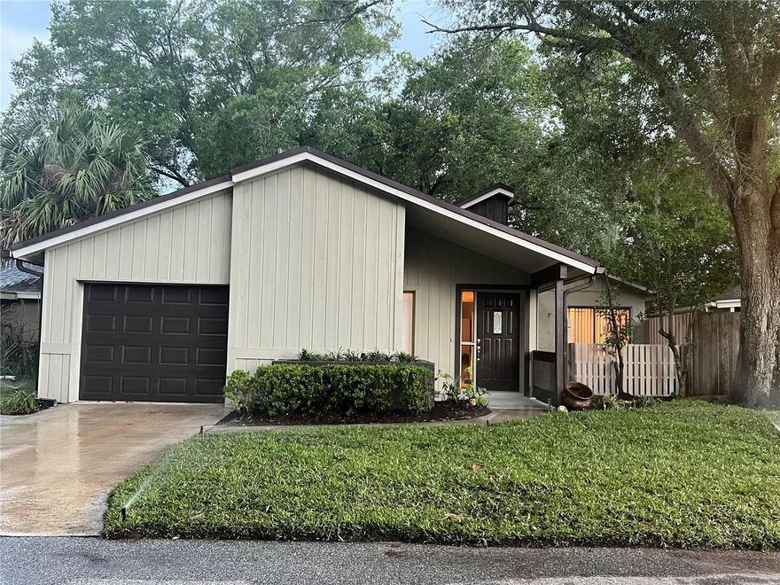 Welcome to refined, low-maintenance living in the highly sought-after Wedgewood Golf Villas within Tuscawilla. Perfectly positioned in one of Seminole County’s most established golf communities, this beautifully maintained residence offers the ideal blend of comfort, privacy, and convenience with golf cart-friendly streets, mature surroundings, and HOA-maintained lawn care for truly effortless ownership.
Thoughtfully updated with a  ROOF (2019), HVAC system (2020), and freshly painted exterior (2026), this move-in-ready 3-bedroom, 2-bath home showcases timeless appeal and functional design. Inside, abundant natural light, soaring vaulted ceilings, and a warm, inviting layout create an atmosphere that feels both spacious and intimate. The expansive great room, anchored by a charming fireplace, serves as the heart of the home — ideal for entertaining or quiet evenings in.
A generously sized 315-square-foot screened lanai extends the living space outdoors, overlooking a large private fenced backyard with endless potential for a custom outdoor retreat, garden, or entertaining space.
The first-floor primary suite offers a peaceful sanctuary with a spacious en-suite bath featuring a walk-in shower. Plush carpeting adds warmth throughout the living areas and bedrooms, while durable tile flooring enhances the kitchen and baths.
Residents enjoy private access to scenic walking trails along the golf course, as well as close proximity to the private Tuscawilla Country Club, Trotwood Park, shopping, dining, nature trails, and top-rated Seminole County schools, with easy connectivity to SR 417 for commuting throughout Central Florida.
Offering 1,713 square feet under air and 2,131 total square feet, this exceptional residence presents an outstanding opportunity for discerning buyers seeking comfort, community, and a lock-and-leave lifestyle in the heart of Tuscawilla.