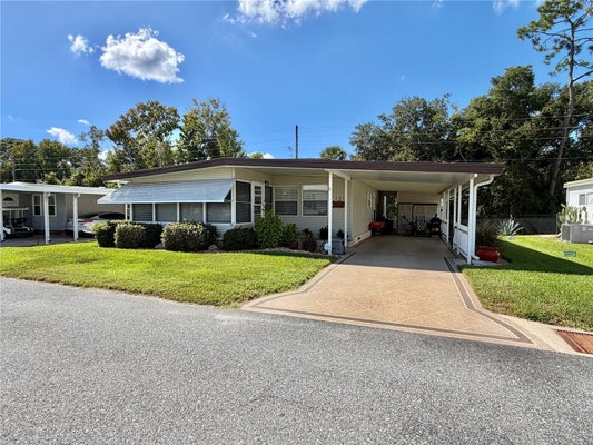 131 BOUGAINVILLEA DR, LEESBURG, FL 34748 - Image bffadce2bf8e5933be100b90b163c4ee/1196160779
