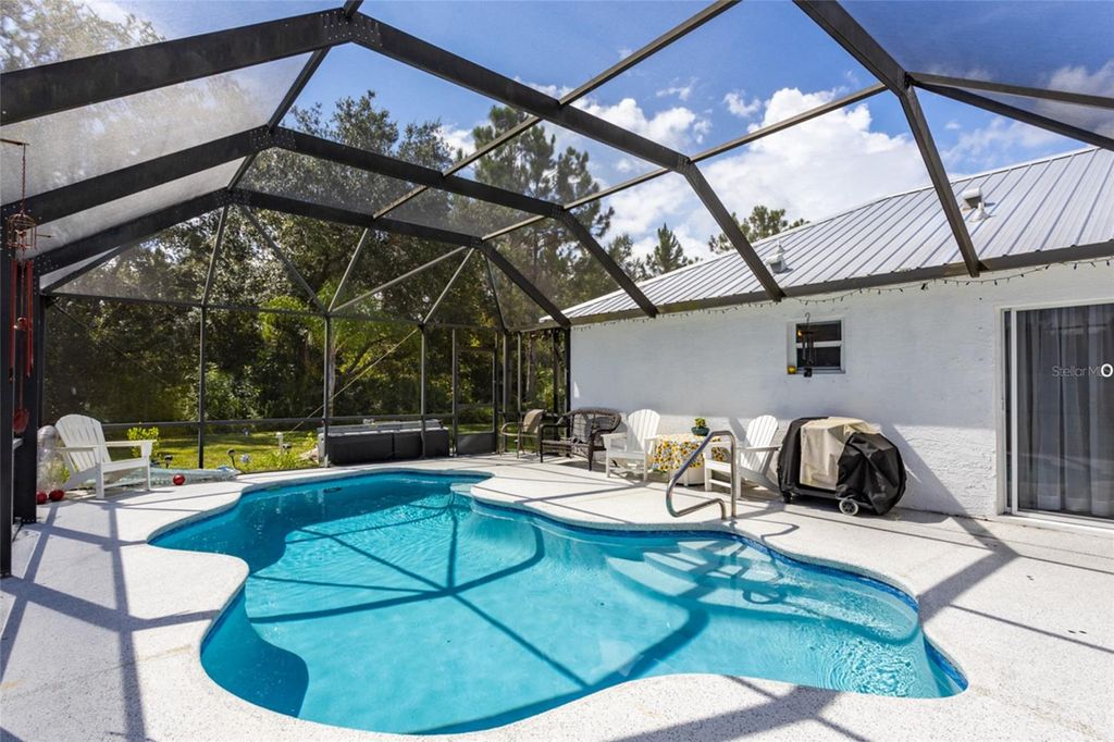 Photo of 12 Lee Drive, Palm Coast, FL 32137 (MLS # FC311837)