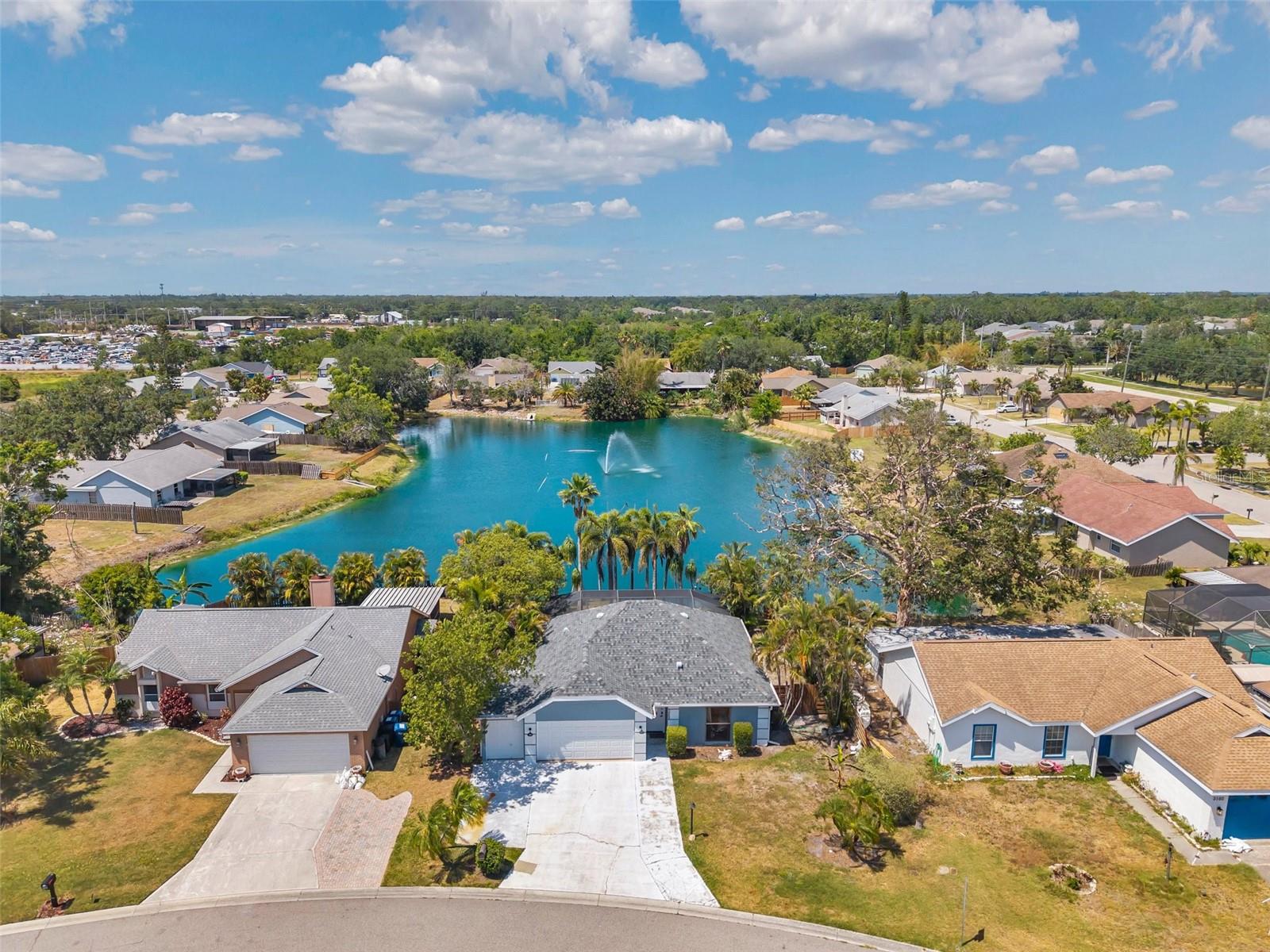 Beautifully remodeled 2-bedroom, 2-bathroom home with a 2-car garage PLUS A RARE 3RD BAY, this home offers an INCREDIBLE LAKE VIEW and a spacious, thoughtfully designed interior. From the moment you arrive, you’ll feel like you’ve discovered a HIDDEN OASIS—peaceful and private, yet conveniently located near everything Sarasota has to offer.
The home features a NEW KITCHEN with NEW CABINETS and NEW QUARTZ COUNTERTOPS, a RENOVATED PRIMARY BEDROOM, and ALL-NEW FLOORING throughout the main living areas and bedrooms. Vaulted ceilings and an open layout with a LARGE KITCHEN ISLAND enhance the bright, airy feel. The living spaces are FRESHLY PAINTED in neutral tones, and the PRIMARY BATHROOM has been fully updated with a WALK-IN SHOWER, TOILET, and VANITY.
Additional major upgrades include a NEW AIR HANDLER (2022), WATER HEATER (2024), ROOF (2023), and NEW INTERIOR DOORS. The LARGE SCREENED PATIO OVERLOOKING THE LAKE is perfect for enjoying true FLORIDA LIVING, surrounded by PALMS, MATURE LANDSCAPING, and a COOLING LAKE BREEZE.
Ideally located just 6 miles from both downtown Bradenton and Sarasota, 8 miles from Lido Beach and St. Armands Circle, and only 5 miles from UTC—this home offers unmatched convenience while still feeling like a peaceful retreat.