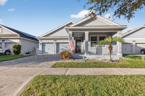 Photo of 12073 Imaginary Way, Orlando, FL 32832 (MLS # TB8445708)