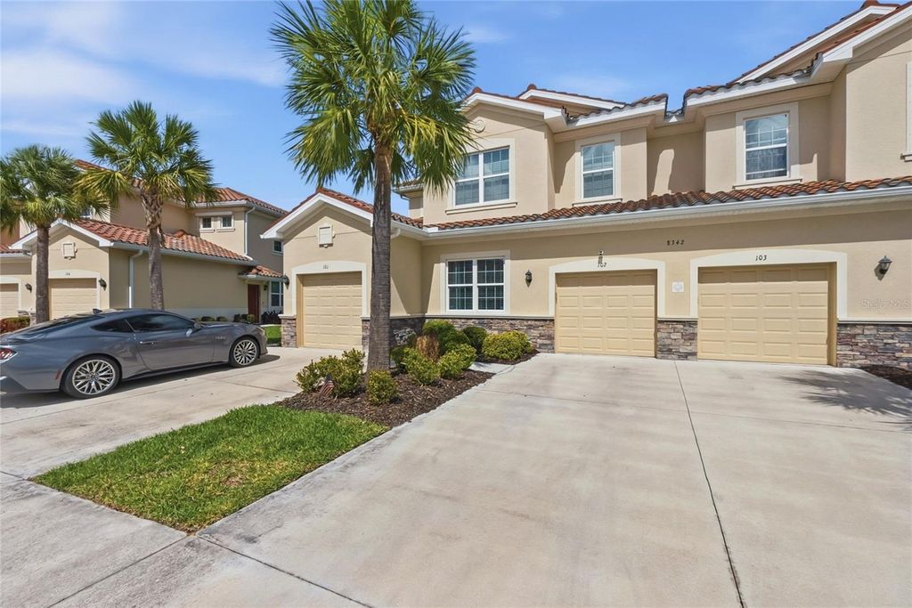 Photo of 8342 Enclave Way #102, Sarasota, FL 34243 (MLS # A4688186)