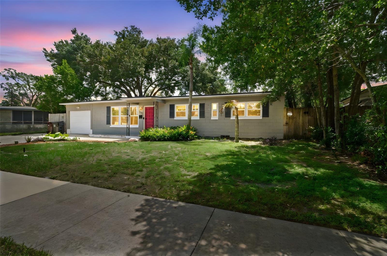 **SELLER FINANCING 4.99%** Great opportunity for a home close to the 408 with easy access to downtown Orlando airport and everything the city has to offer. The bright, open layout features a spacious family/dining room combo anchored by a beautiful fireplace, perfect for entertaining. Sliding doors open to a giant screened porch that extends your living space outdoors. Both bathrooms have been fully remodeled with modern finishes, while upgraded wood-look tile flooring throughout provides style and durability.
The three bedrooms are generously sized and offer flexibility for family, guests, or office space. Storage is abundant, making it easy to stay organized. Outside, the large private backyard is ideal for gatherings, gardening, or simply enjoying the Florida sunshine.
This move-in ready property is perfect for homeowners or investors seeking for a home in a central Orlando location. Schedule your showing today!