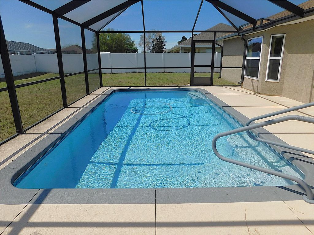 Photo of 6920 SE 103 Place, Belleview, FL 34420 (MLS # OM721023)