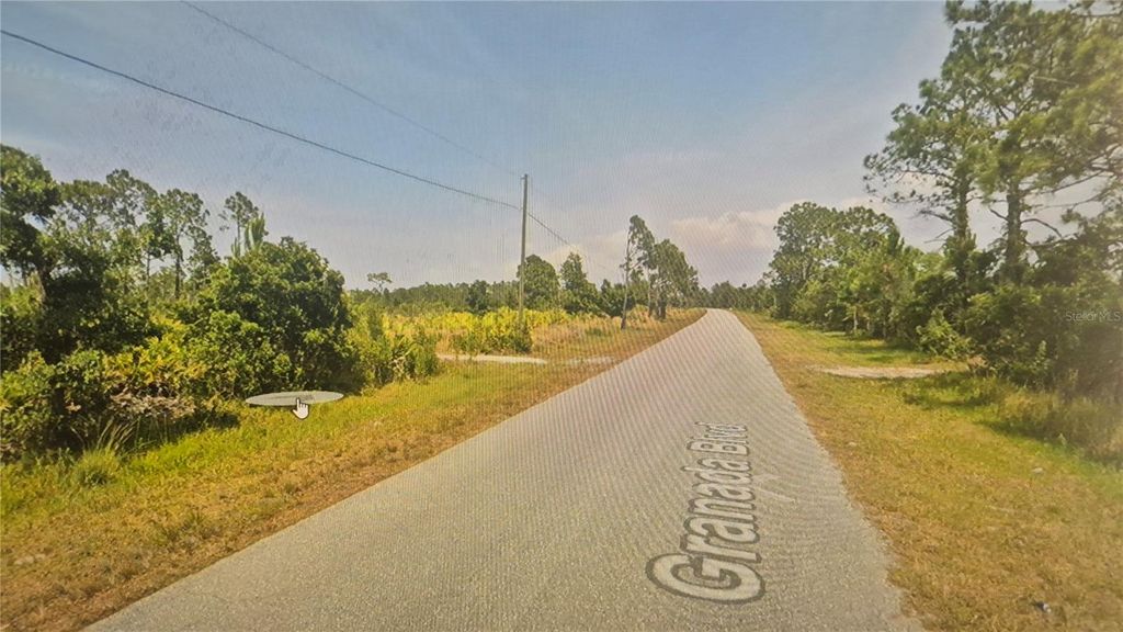 Photo of 8014 Granada Boulevard, Sebring, FL 33872 (MLS # O6398957)