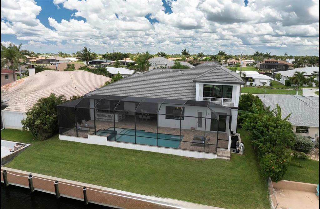 Photo of 1732 SE 40th Terrace, Cape Coral, FL 33904 (MLS # A4656626)