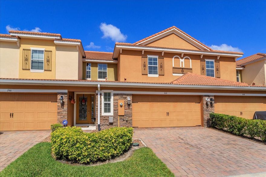 This beautiful, former model townhome has it all and includes many design upgrades!  This home boasts 2268 square feet which is one of the largest townhomes in the area with 4 bedrooms and a loft with built-in desk perfect for a home office and a rare find of the MASTER BEDROOM on the FIRST FLOOR! Enter into this private, gated community in a sought-after location and park in your spacious 2-car garage with paver driveway and enter the home with a ½ bath on your left.  As you continue in, on your left is the inviting entryway and laundry room or to your right, enter into a gorgeous, large kitchen with 42” cabinets, granite countertops with glass backsplash, a large island with more cabinets, stainless steel appliances and large pantry.  The kitchen also features a beautiful, warm, decorative stone accent wall and matching breakfast bar façade and luxe pendant and sconce lighting and undercabinet lighting.  This has an open concept floor plan with the kitchen overlooking the dining area and family room.  The upgraded features continue with crown moulding throughout.  The large family room has vaulted ceilings looking up towards the upstairs loft and through the sliding glass doors is an upgraded extended screened-in patio lanai great for entertaining while enjoying a bug free evening.  The most extraordinary feature is the FIRST-FLOOR MASTER BEDROOM and ensuite bathroom.  The large master bedroom and sitting area includes upgraded engineered hardwood flooring and tray ceiling.  The ensuite bathroom features a double vanity with quartz countertops and a large soaking tub and separate private shower.  Just off the entry way is the stairs that leads you up to the loft with a built-in desk perfect for a home office or study/hang-out area.  Through an archway, off of the loft are large bedrooms 2 and 3 with upgraded decorative wall moulding and a full bathroom with upgraded tile and quartz countertops. Bedroom 4 is adjacent to the loft and is currently being used as a private office.  The community amenities include a pool, clubhouse with large fitness center with lounge area and back porch overlooking a park-like setting and private lake with pet stations and walking path.  This community is conveniently located within a mile of all major highways (I4, 417 and 429), great restaurants, shopping and entertainment.  This townhome is currently TENANT OCCUPIED and the lease expires in December.