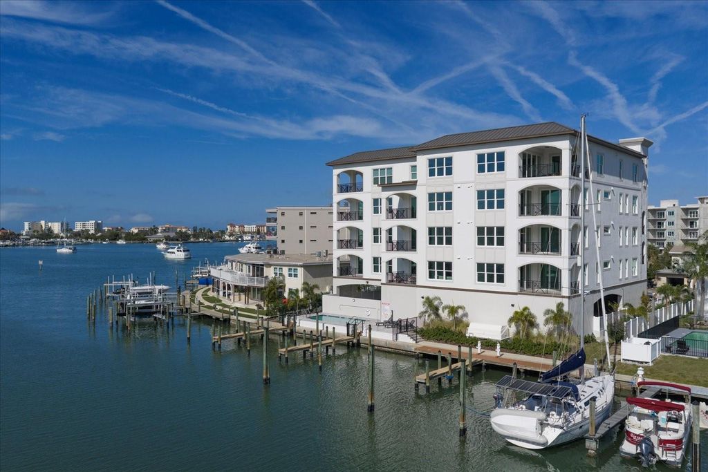 Photo of 211 Dolphin Point #1, Clearwater Beach, FL 33767 (MLS # TB8458724)
