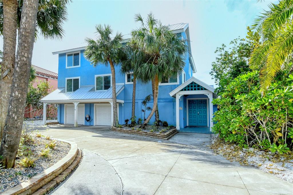 Incredible BEACHFRONT HOME! 80 feet on the Gulf of Mexico and wonderful sandy beach plus year round outstanding sunsets. This five bedroom home features an open floor plan that includes the main living area, kitchen and dining space all opening to the lanai and outdoor patio surrounded by beautiful landscaping. The first level has two downstairs guest bedrooms. A spacious, private master suite on the third level offers total privacy plus a large master bath. Outstanding views of the beach, Gulf and sunset are enjoyed from the master bedroom and the adjacent porch. The third level split plan features two other guest suites. This location on Gulfside Road offers a unique opportunity to live on a quite loop beachside of Gulf of Mexico Drive. The first level open floor plan takes full advantage of the inviting beach and the Gulf waters. You will enjoy walking this beach and watching the amazing wildlife. There is an attached two car garage plus ample parking in the driveway. This north Longboat location is near many outstanding restaurants.