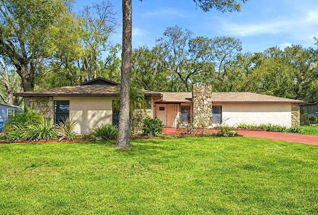 Photo of 314 E 137th Avenue, Tampa, FL 33613 (MLS # TB8474559)