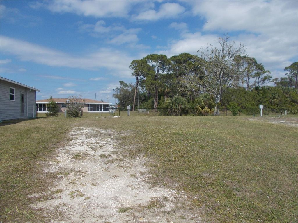 Photo of 5552 Holiday Park Boulevard, North Port, FL 34287 (MLS # C7512953)