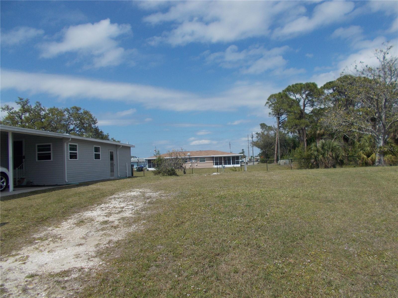 Vacant land in sought after Gated Community of Holiday Park, not in the pet section. In Holiday Park you own the land with a deed and the maintenance fee of $195.00 monthly ($2340.00 a year) is included in your taxes. This lot measures 3987 sq ft. Holiday Park offers many amenities including 2 Pools, Tennis Courts, Pickle Ball, Bocci, Shuffleboard, Laundry, Library, Tennis, Horseshoes, Bingo plus other card games, Fitness Room and so much more. This is a perfect place for your new manufactured home. Come and see!