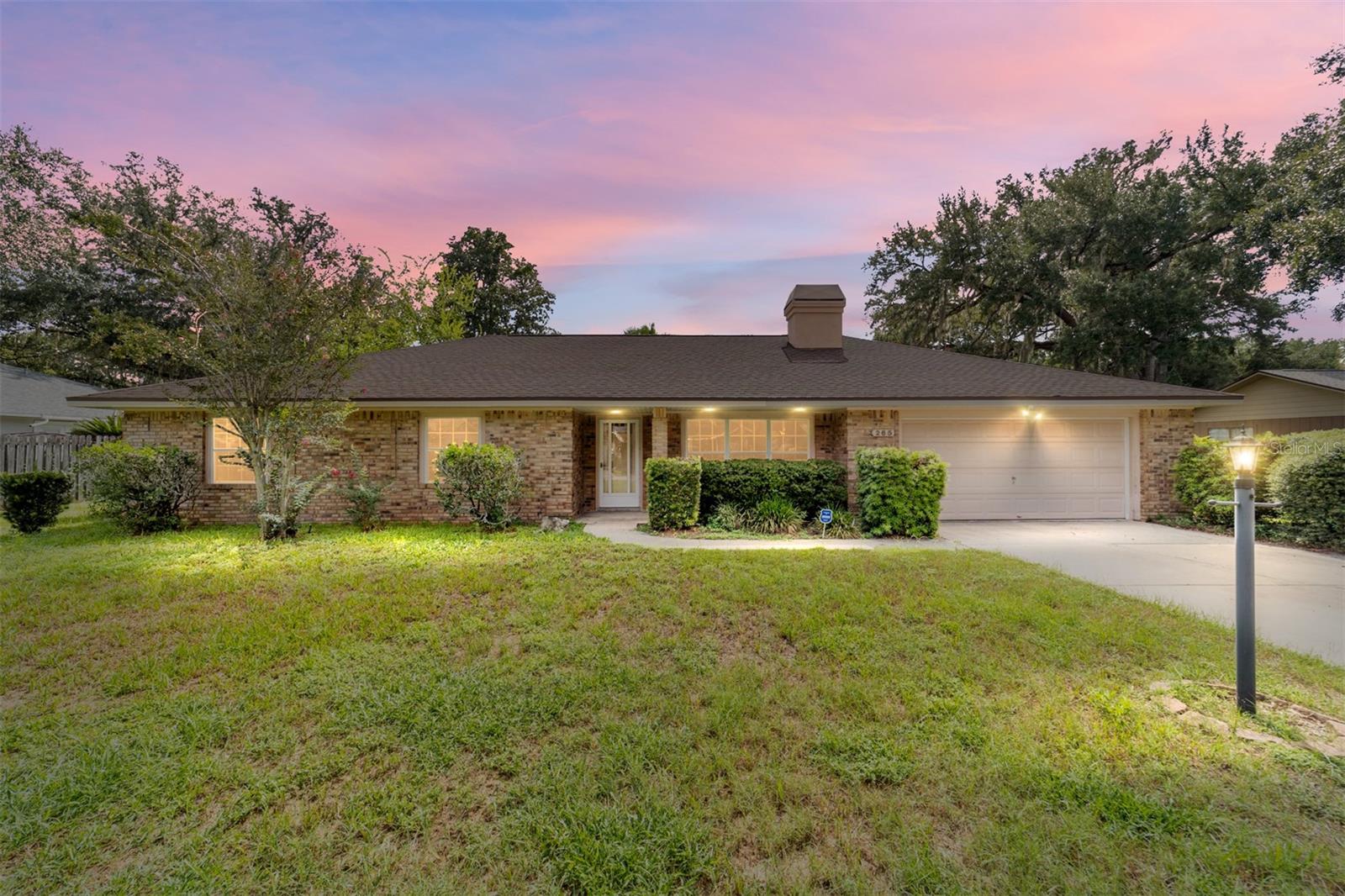 Wonderful home ready for new owner. Wood laminate featured throughout living areas. Great room features a wood burning fireplace. Large dining area with French doors opening to great backyard. Kitchen has plenty of cabinet space, granite and stainless appliances. Huge breakfast nook surrounded by windows - perfect for starting the day. Master bedroom is a good size with a walk in closet and updated bathroom. Two guest bedrooms - one featuring a wall of built ins, perfect for those working remotely. Great fenced in back yard.