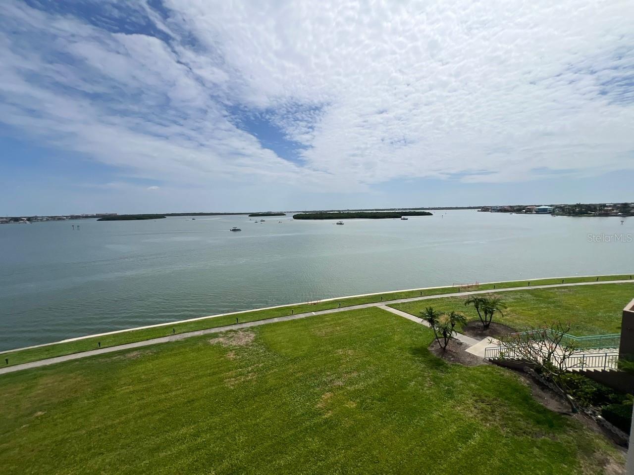Spectacular Waterfront Community has it all! This turn key furnished 1 bedroom, 1 bath unit offers breathtaking views of the Intra Coastal Waterway and is your front seat to watch the dolphin and manatee play. Gorgeous skies await as they change throughout the season. Whether your laying in bed, sitting on your private balcony or lounging on your leather sofa, it's definately the perfect way to start & end your day! The kitchen is updated and complete with stainless steel appliances. Spacious dining area too. Enjoy the convenience of having a washer and dryer in your unit. Tile throughout keeps things easy to clean. Assigned covered parking will keep your car protected from Florida weather elements and hot sun. This community offers resort style amenities. The pool is heated for you to enjoy during the cooler months but the bonus is the chiller that keeps the water cool & refreshing during our hot summer season. The pool area also has a seperate spa to enjoy. Waterfront shuffleboard and putting green. Tennis players bring your racket. Plenty of boating actiiity to enjoy while your using the waterfront grill! Saving the best for last is the fitness center complete with men's and ladies sauna. Take the stairs for exercise or hop on the elevator to your slice of paradise. Don't delay in rentiing this unit.
