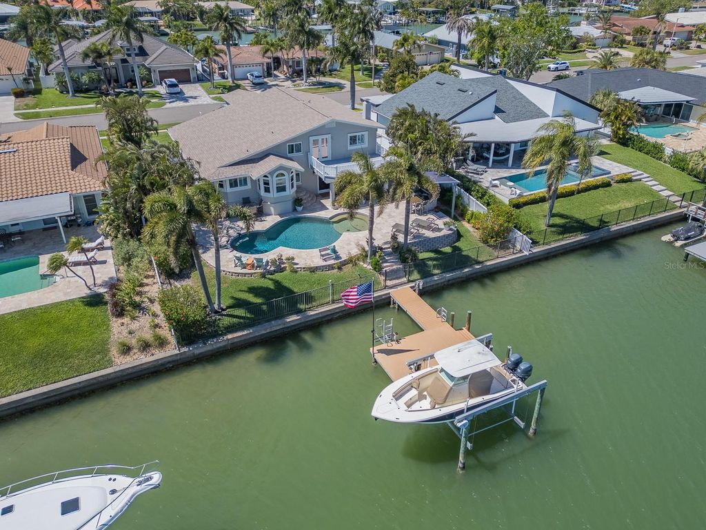 Photo of 707 Snug Island, Clearwater Beach, FL 33767 (MLS # TB8489063)