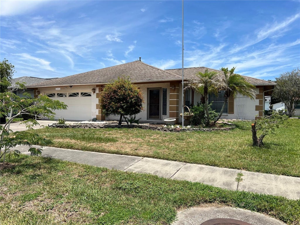 Photo of 10738 Lazy Lake Dr, Orlando, FL 32821 (MLS # G5113590)