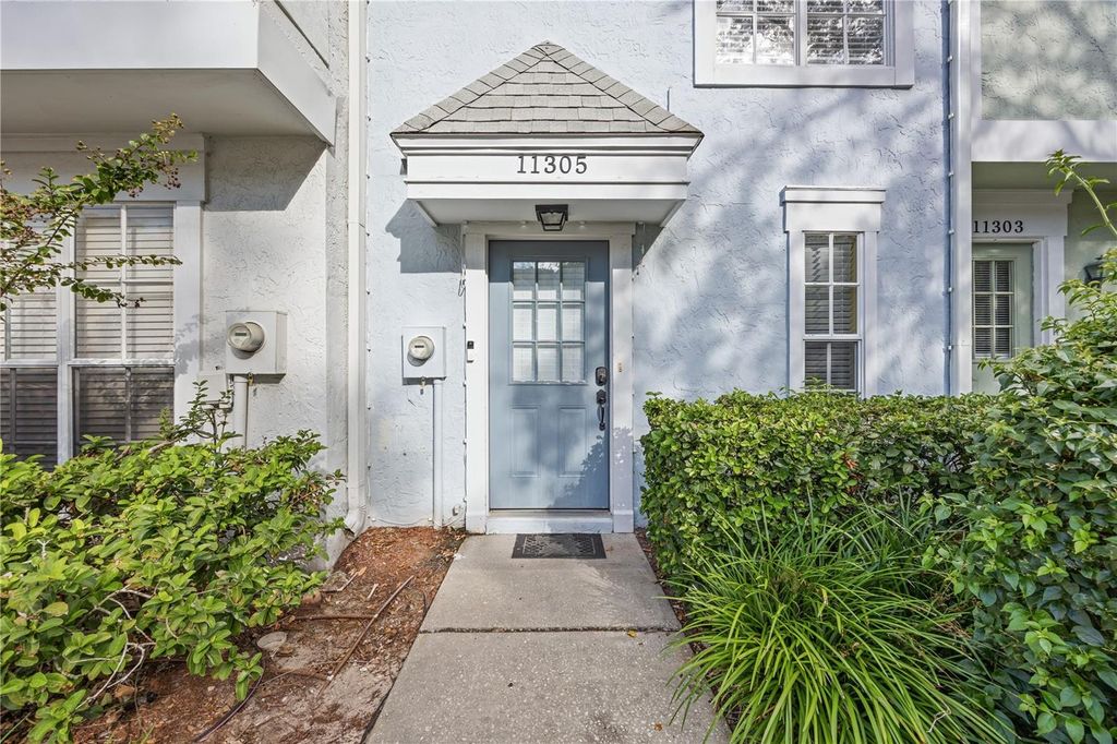 Photo of 11305 Grandville Drive, Temple Terrace, FL 33617 (MLS # TB8435520)