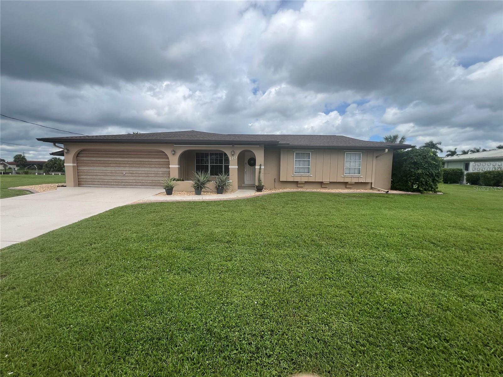 **ANNUAL** GORGEOUS 3/2/2 HOME AVAILABLE NOW** This home has incredible water views and is situated in a great neighborhood within walking distance to a community swimming pool, tennis courts, playground, and boat ramps. Boasting BEAUTIFUL wood tile flooring, updated kitchen, stainless steel appliances, NO FIXED BRIDGES, and 13000 LB BOAT LIFT!! Your dream home is waiting!!! Call for showing appointment today!!