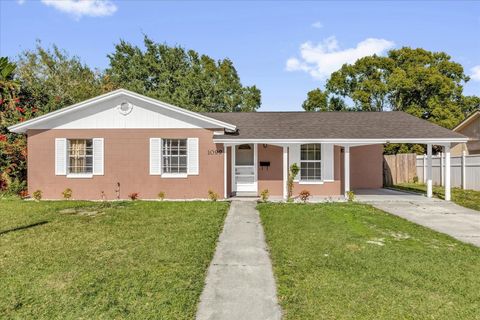 Photo of 1099 NE Leeway Ct, Orlando, FL 32810 (MLS # O6375202)