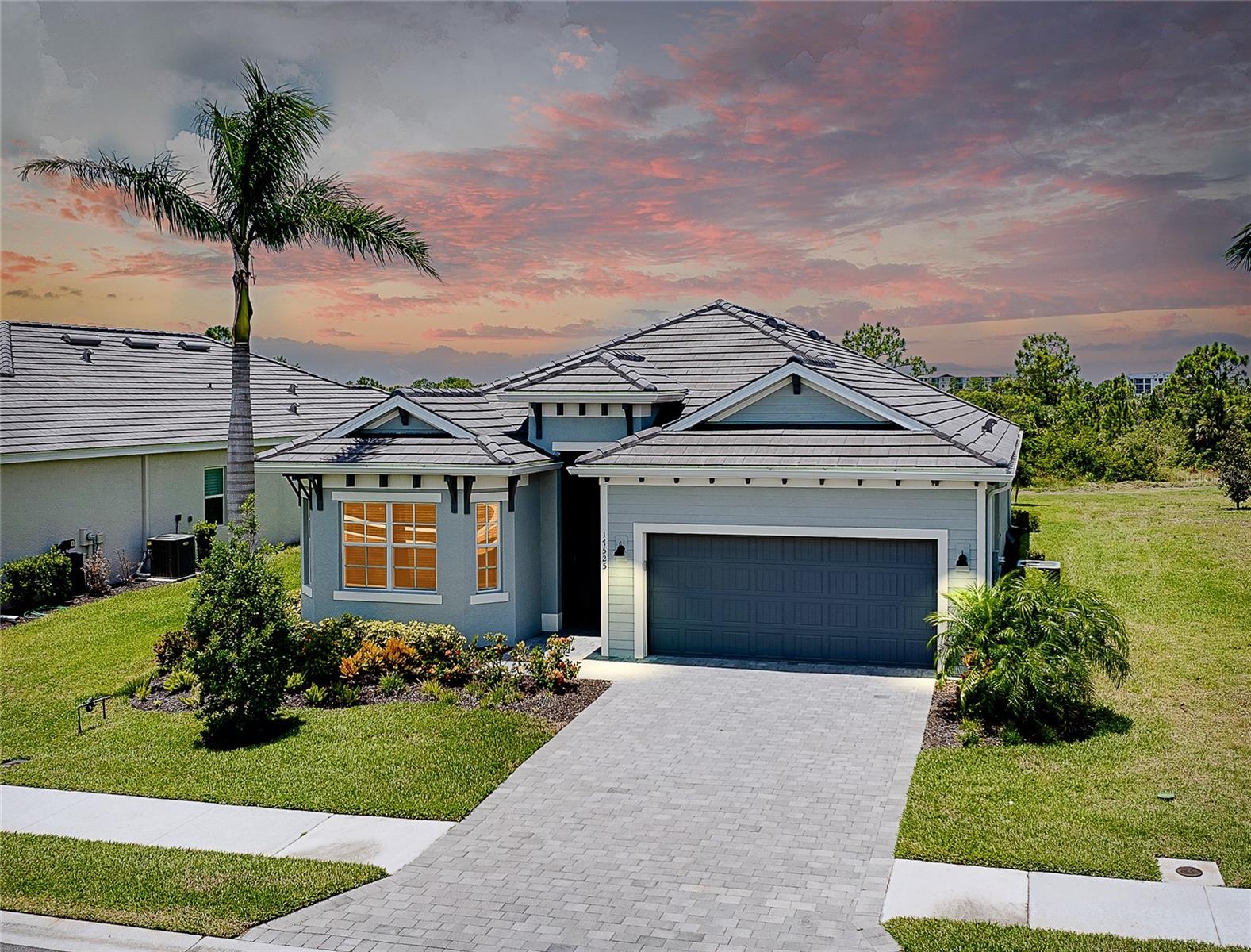 Welcome to this absolutely stunning home that includes full golf memberships-the builder is now sold out of single-family golf membership homes! Perfectly situated on a gorgeous private lot backing to a peaceful preserve, this home offers incredible sunset views from the lanai and is designed for both relaxation and entertaining. The lanai features an outdoor kitchen that has a built-in grill and refrigerator, plus a unique walk-up window bar from the indoor kitchen to the lanai, making hosting effortless and fun. Step inside and you will love the light and bright interior with plenty of windows, large kitchen with a beautiful quartz countertop island, high ceilings, decorative trays and an open split floor plan that ensures you and your guest privacy. The great room and primary bedroom both feature sliding glass doors that lead out to the spacious lanai, seamlessly blending indoor and outdoor living. Additional special features include beautiful custom built-in cabinetry in the great room, built-in cabinets in laundry room with upgraded faucet, custom curtains, backsplash, decorative lighting and fans, hurricane impact windows and doors, reverse osmosis water system in kitchen, insulated garage door, rain gutters, and so much more! Located in Wellen Park's most sought-after gated golf community, residents enjoy an unbeatable lifestyle:golf, resort style pool, tiki bar, pickelball, clay tennis courts, bocce ball, fitness center, salon/spa, and a vibrant calendar of organized social events. Just a golf cart ride away is Cool Today Stadium (home of Brave's spring training), grocery store, and downtown Welllen Park for resturants and shopping. All of this and close to beautiful Florida beaches! This home is a must see! Schedule your showing today!
